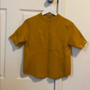 Yellow short sleeve shirt
